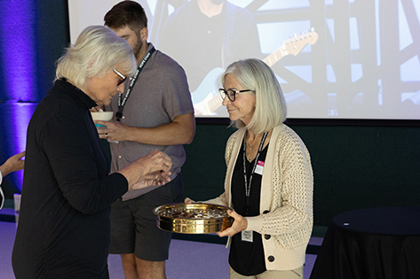 Volunteer serving communion 