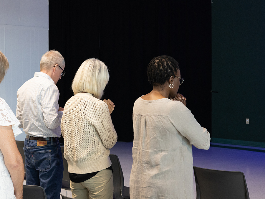 people praying during worship service