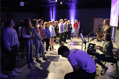 students worshiping at Kairos 